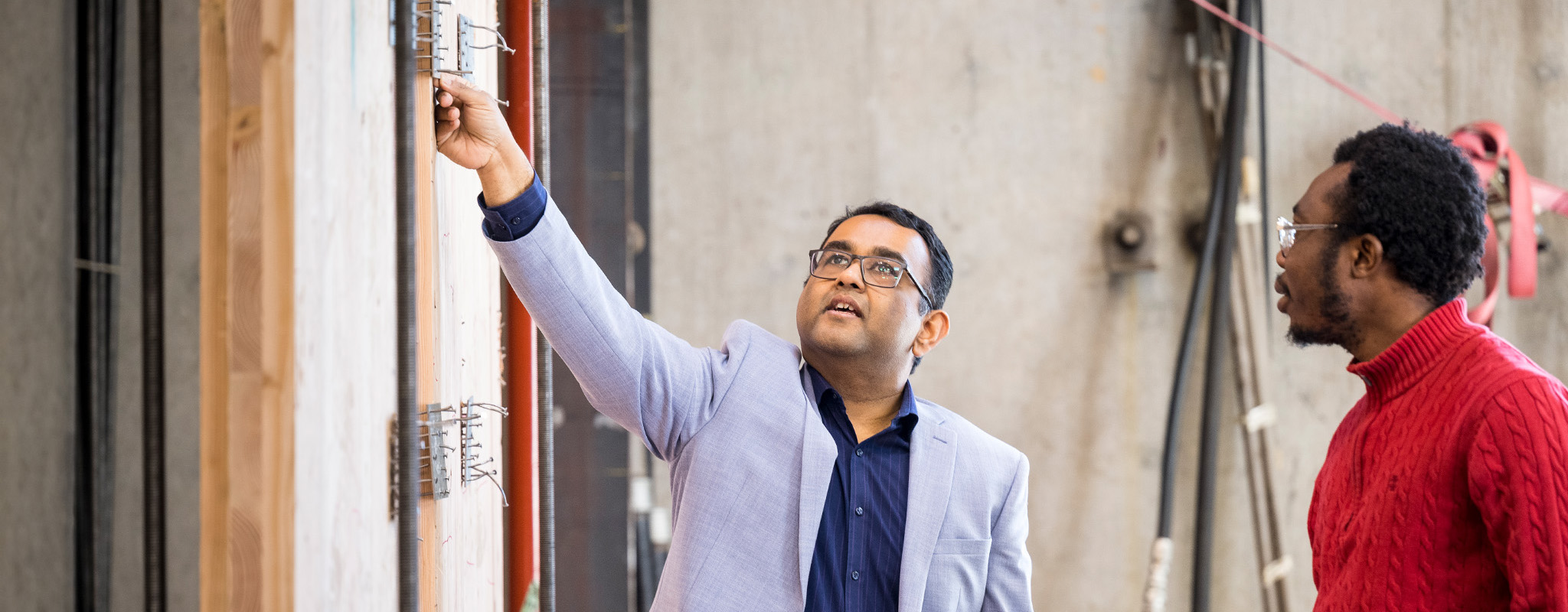 Professor Ari Sinha and student in the AWP lab