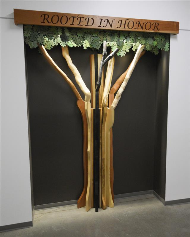 Rooted in Honor sculpture installed in Peavy