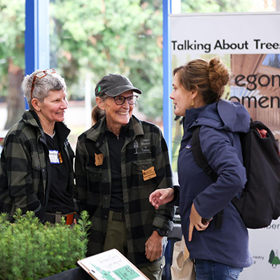 EJ Davis visits with attendees to Tree School Lane 2025