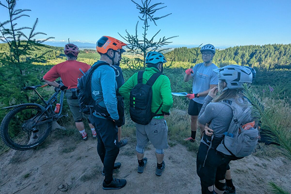 Jake Barker discusses forest management with mountain bike riders