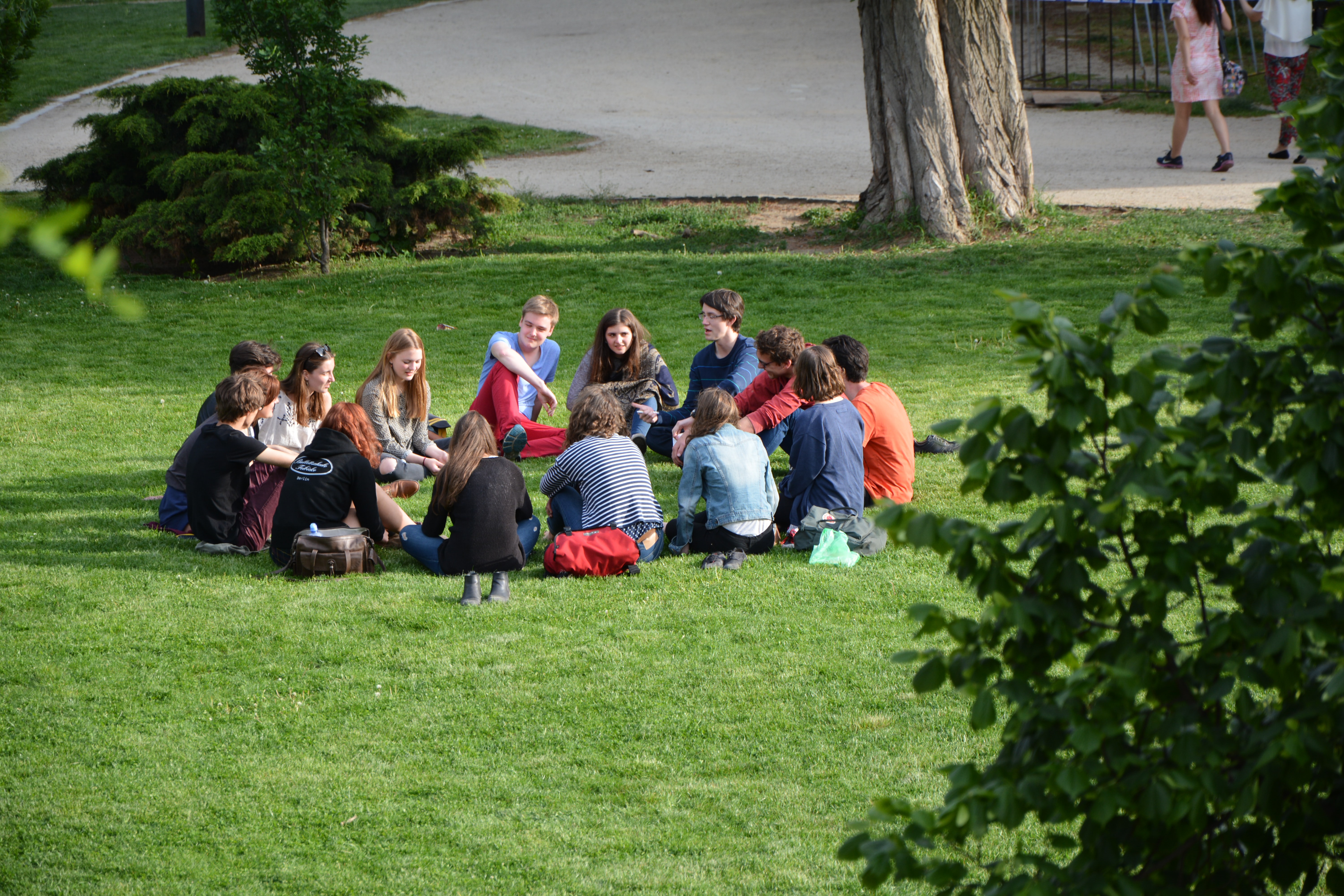 students talking in a circle