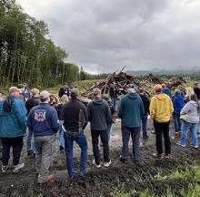 At the PH Timber, LLC-Broken Gate fire site, presenters explained the consequences of a human-caused wildfire, the risks posed by unburned slash piles and the work involved in salvage harvesting and replanting. 