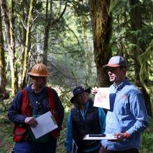 OSU Extension forester Jake Barker shows a map of the site on a stop during the Climate-Informed Forestry Tour, held in April at OSU’s Matteson Demonstration Forest in Gaston.