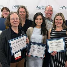Members of the OSU Extension Communications office (from left) Ezraelle McLachlain, Janet Donnelly, Michele Scheib, Grace Xue, Rick Banks, Jennifer Alexander and Chris Branam pose with awards at the ACE Conference in Billings, Montana.
