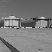 South facades of Hangar 2 and Hangar 3, Naval Air Station Moffett Field. Stephen D. Schafer, 2022. Courtesy Library of Congress, Prints & Photographs Division, HAER, CA-335-B-43